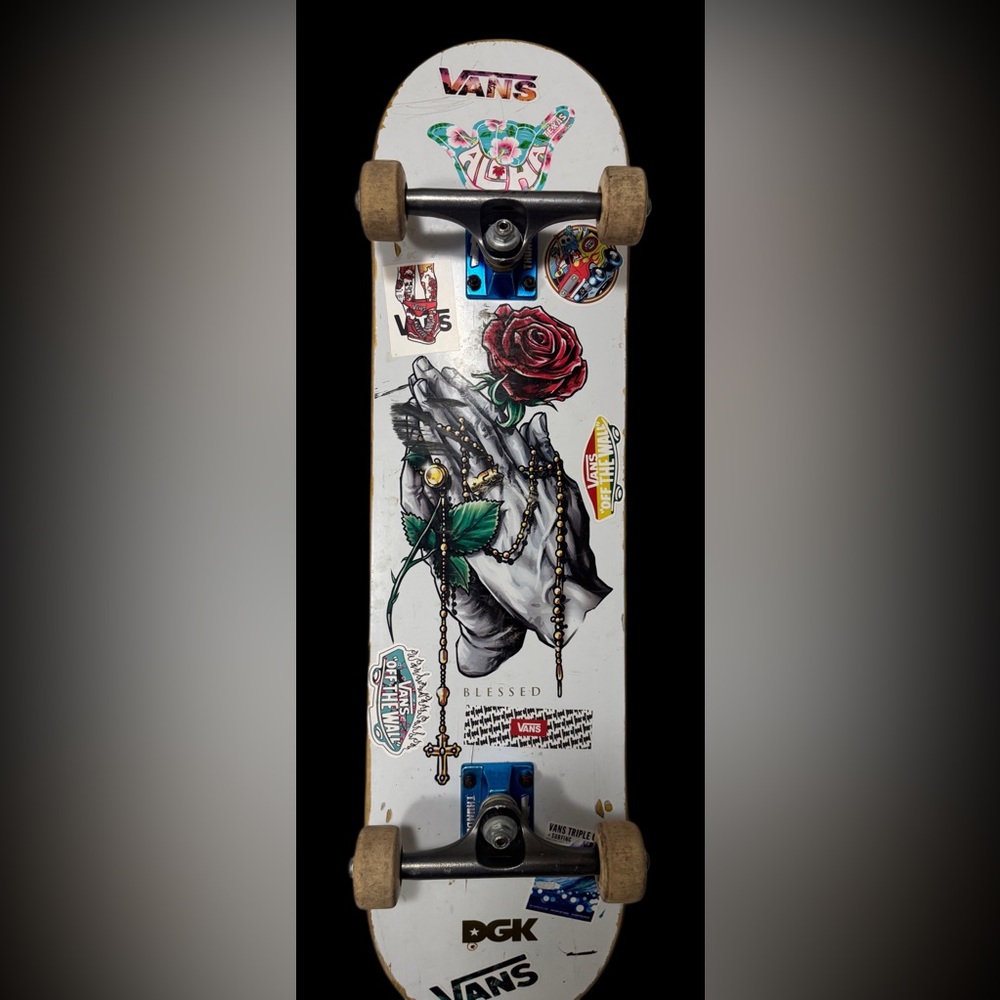 DGK White Skateboard with Colorful Graphics